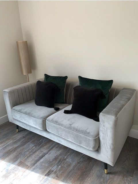 Grey Slender Sofa in Lauren Johnson's living room