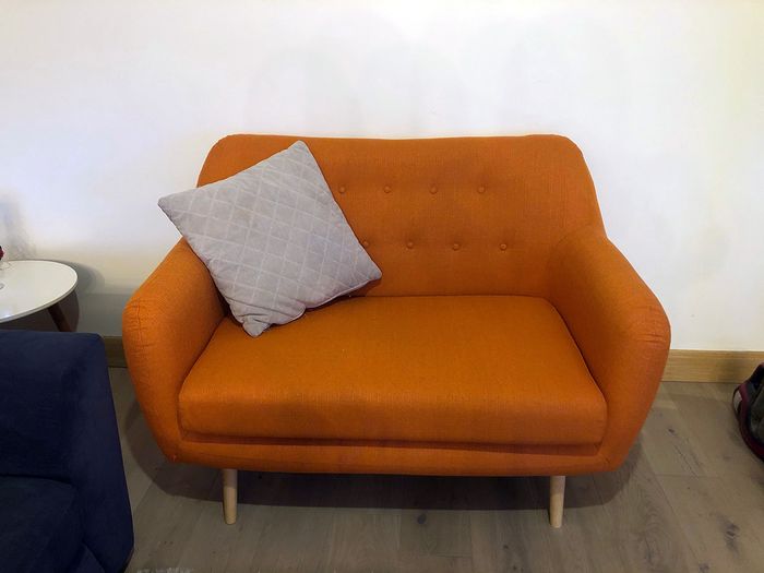 Orange retro sofa Revive