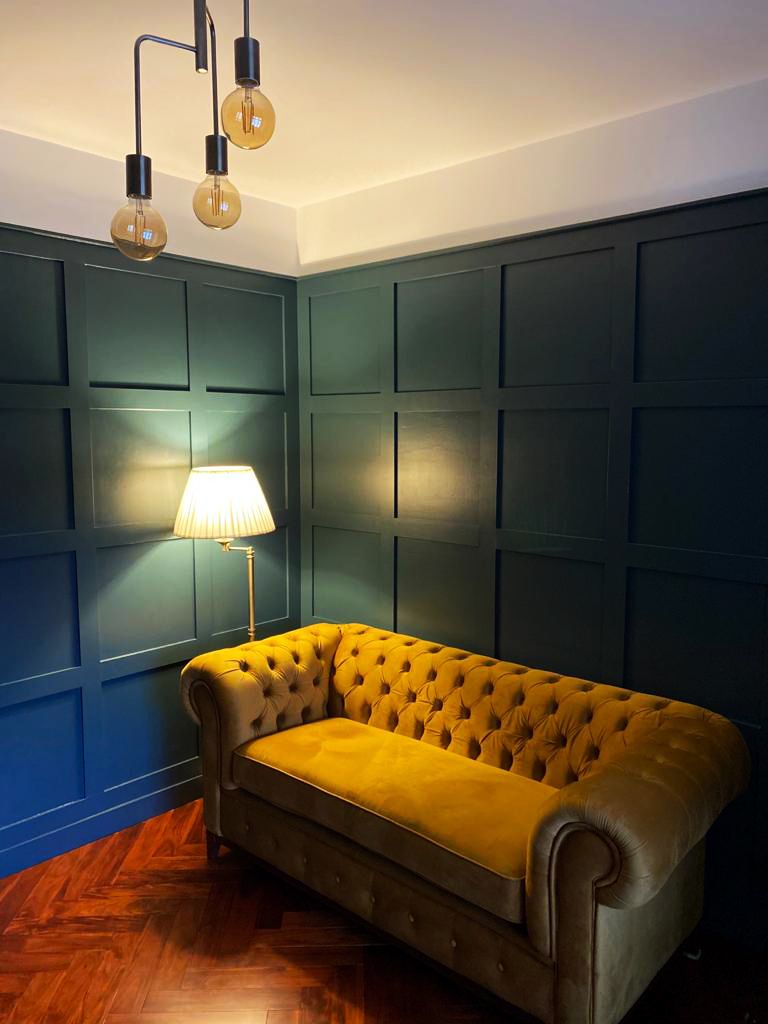 Chesterfield Grand double mustard sofa in a retro room