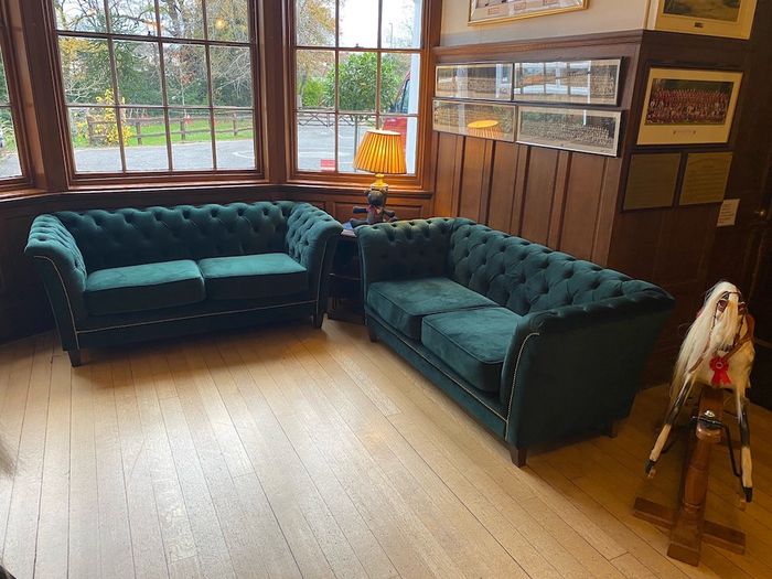 Karin dark green quilted sofas