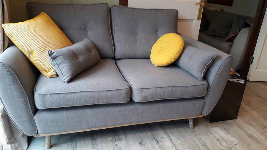 Small grey Zinola sofa with light wooden legs