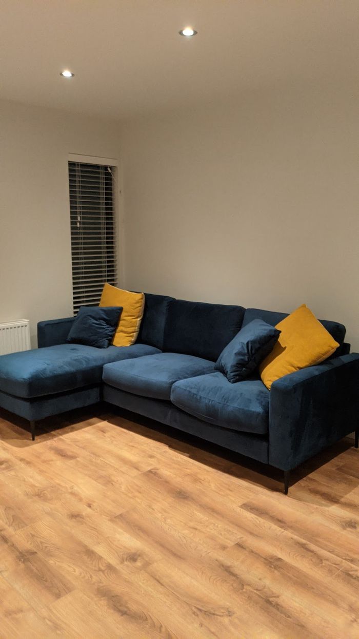 Canapé d'angle bleu foncé Covex en tissu velours