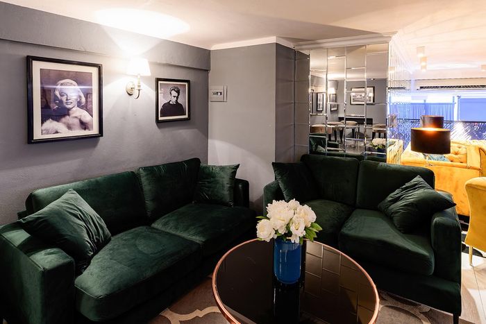 Dark green Covex sofas