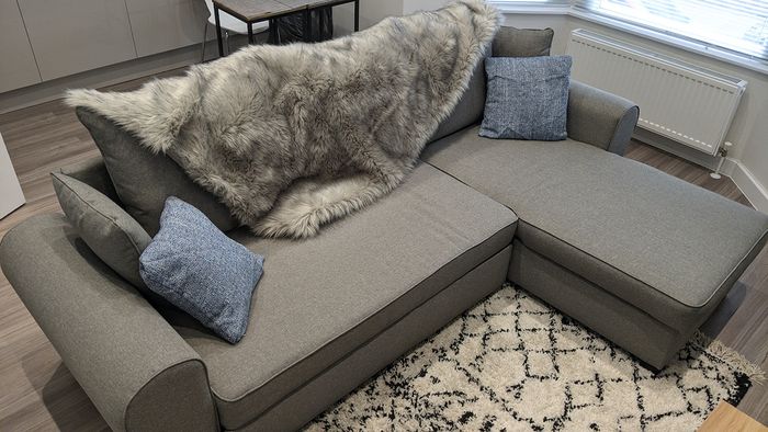 Canapé d'angle gris avec fonction lit Nicea