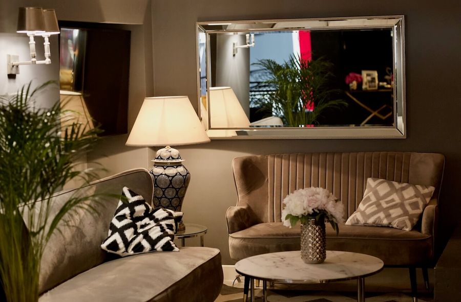 Grey retro style sofas in stylish room