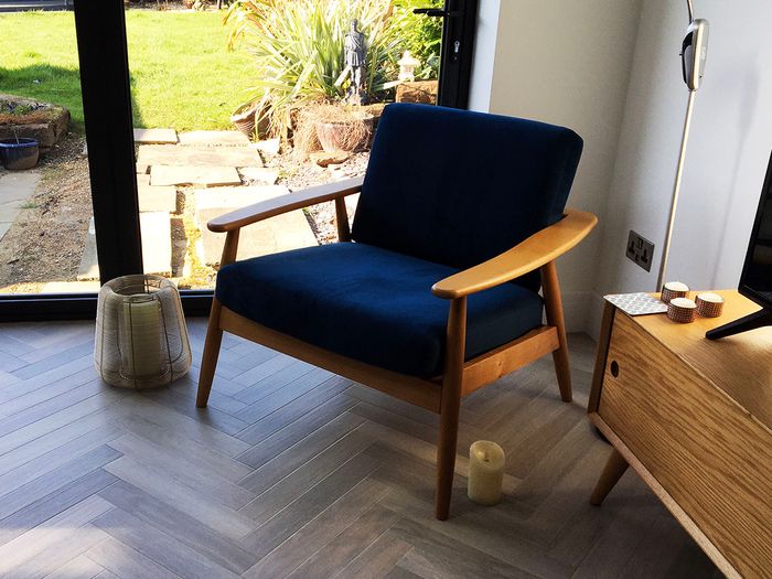 John's blue Demure armchair