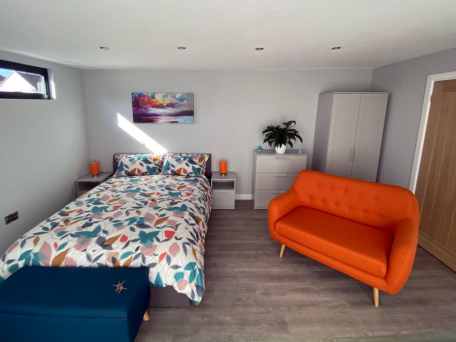 Orange Revive sofa by Liz